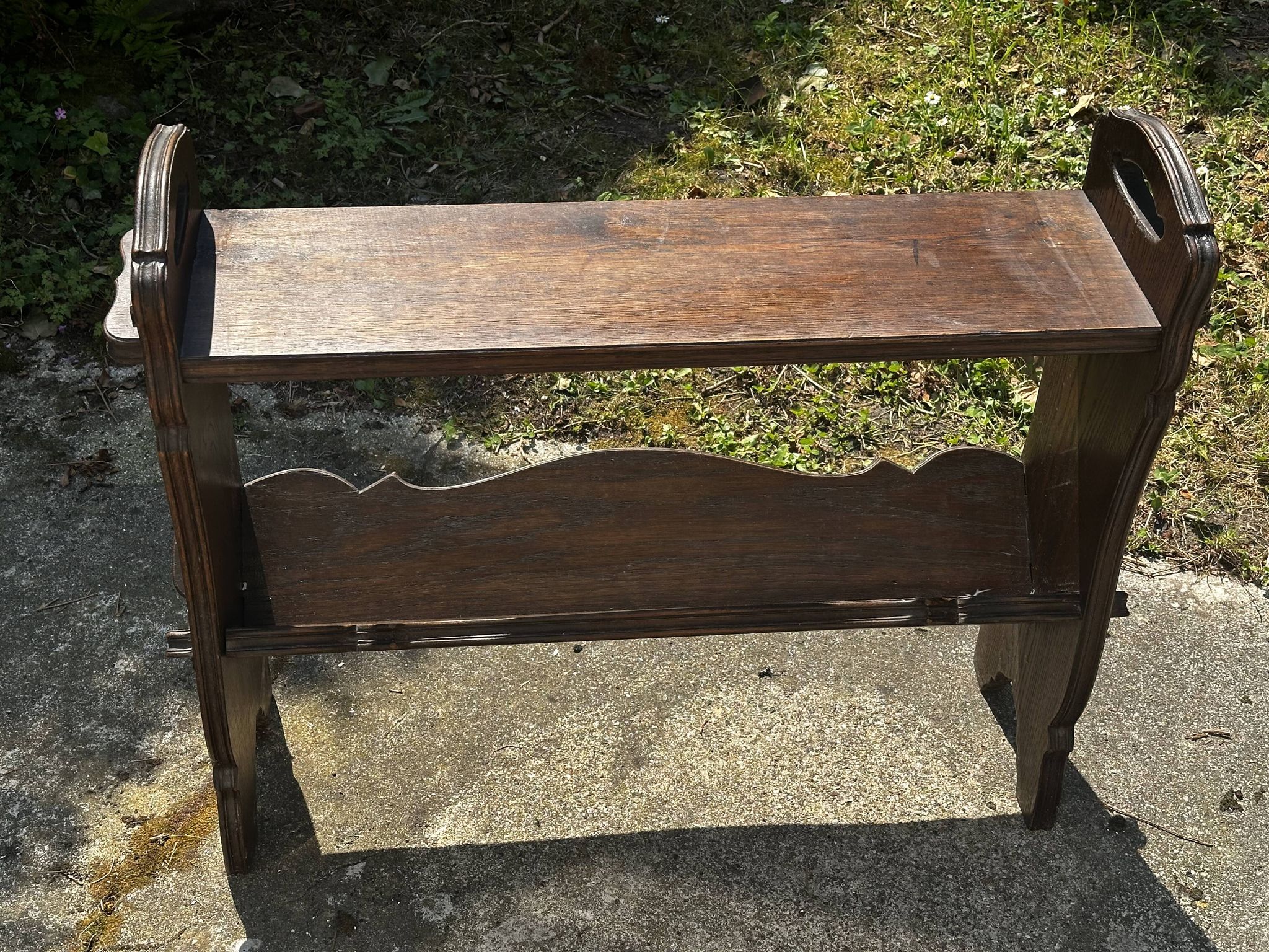 Small magazine rack / accent furniture in dark oak, late 19th century.