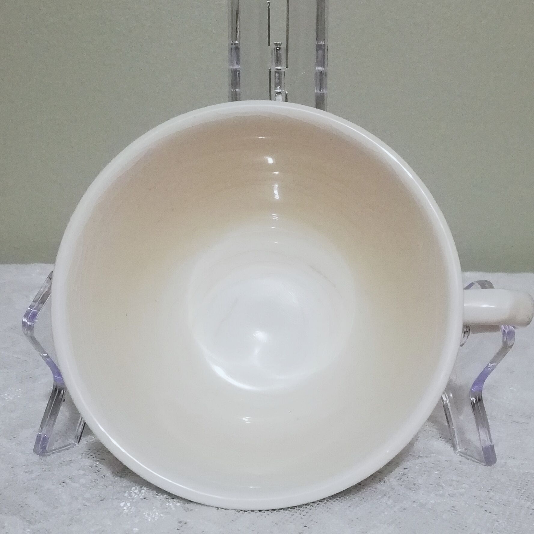 Two ceramic cups by Grignan signed Peguet