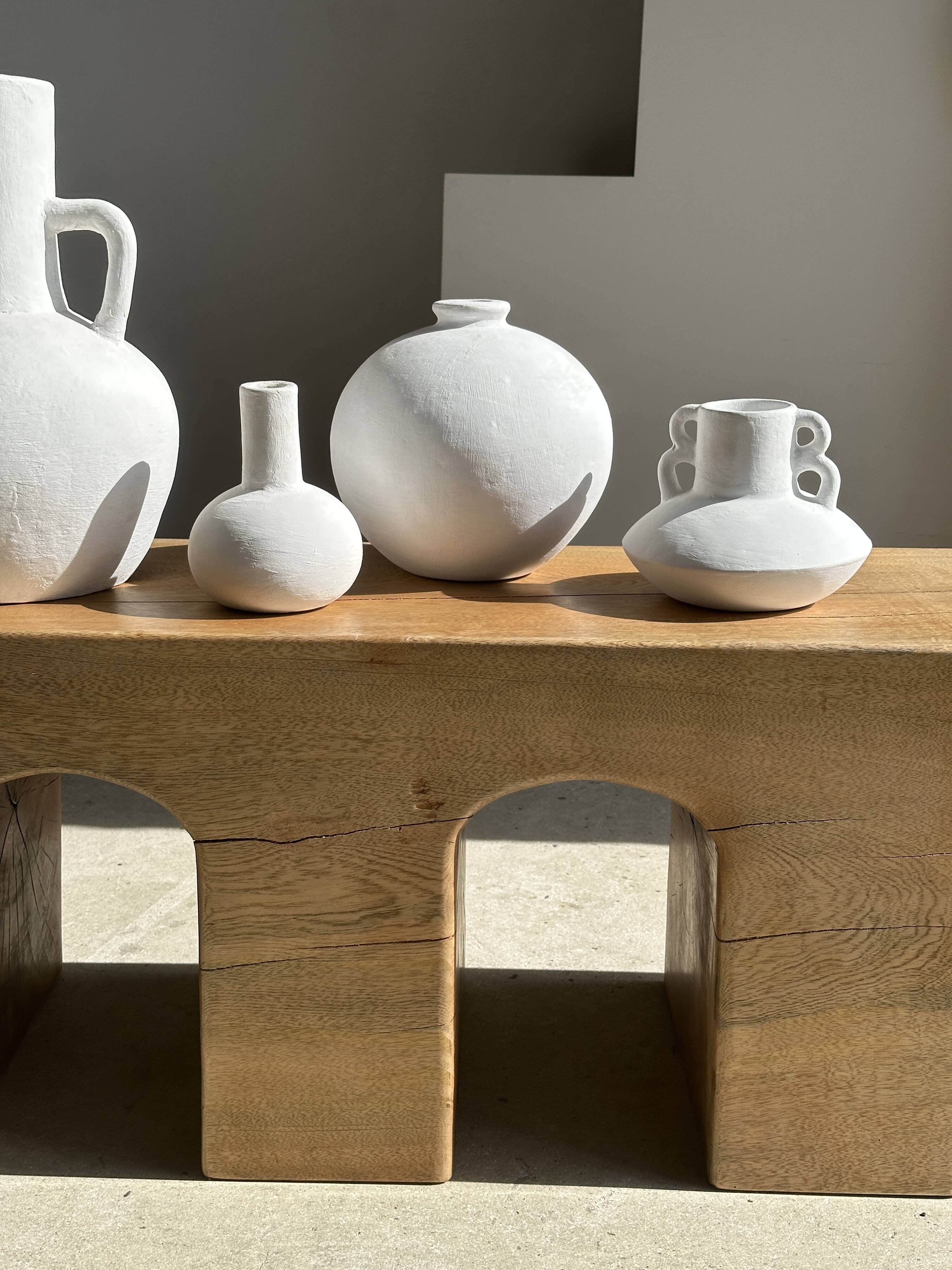 Solid monoxyl wood bench with carved 3-arch base - Natural wood color