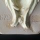 Patinated plaster wall cariatide console