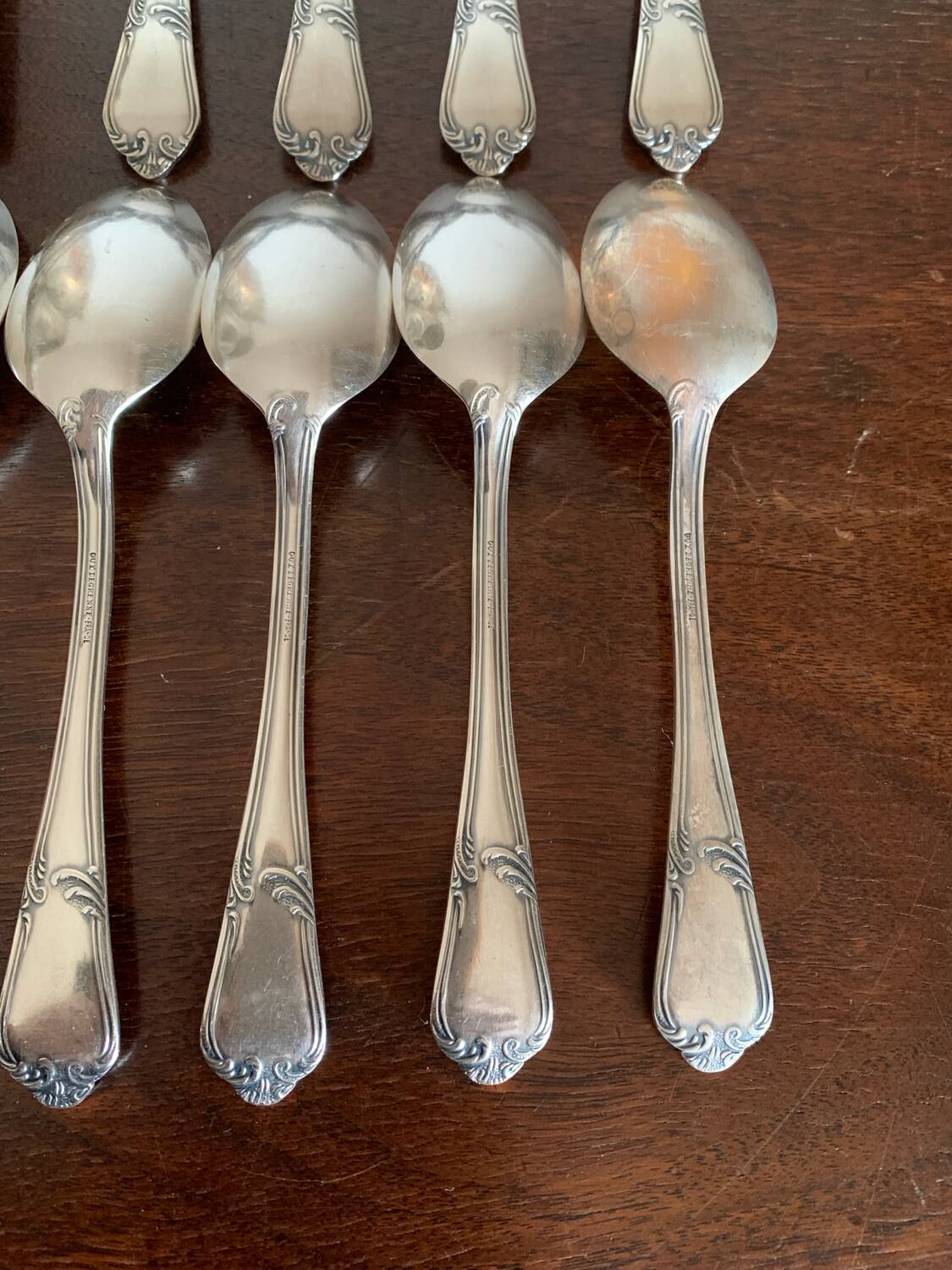 12 small silver metal spoons