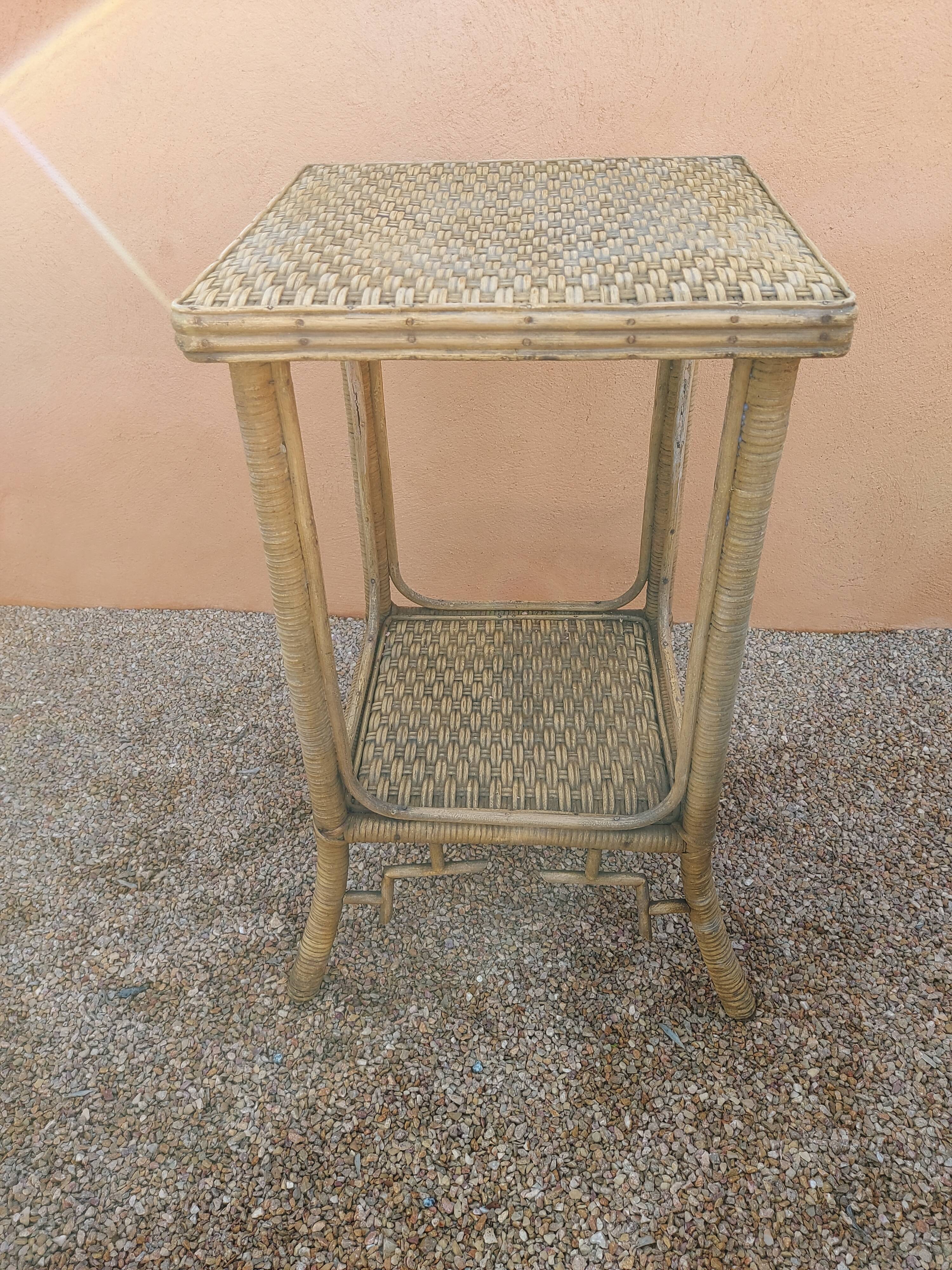 Pair of armchairs and rattan gueridon 1900s
