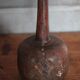 Vintage African wooden carved gourd bottle.