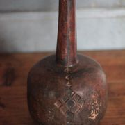 Vintage African wooden carved gourd bottle.