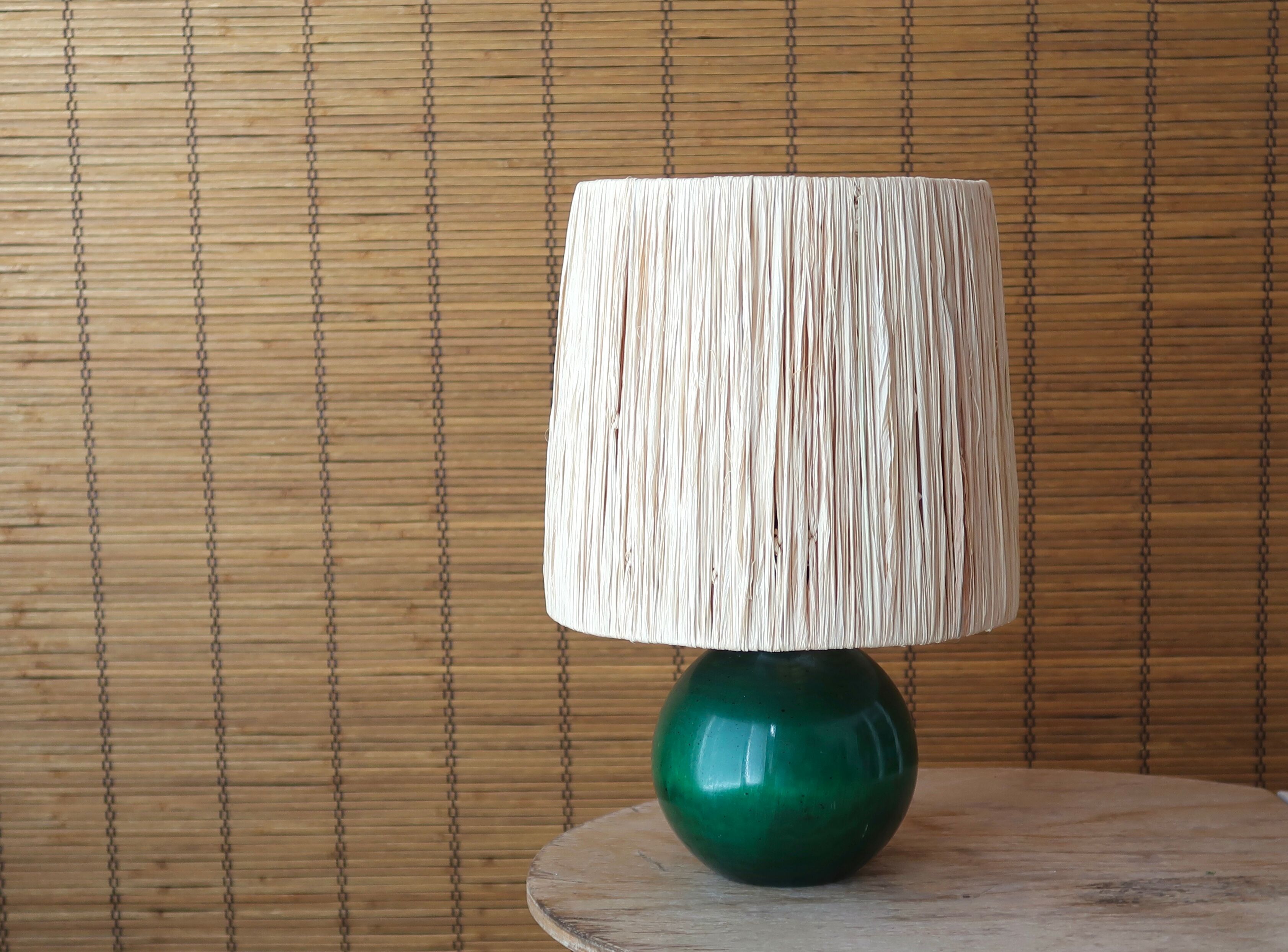 Lamp "ball" in green stained wood, raffia lampshade, 70s