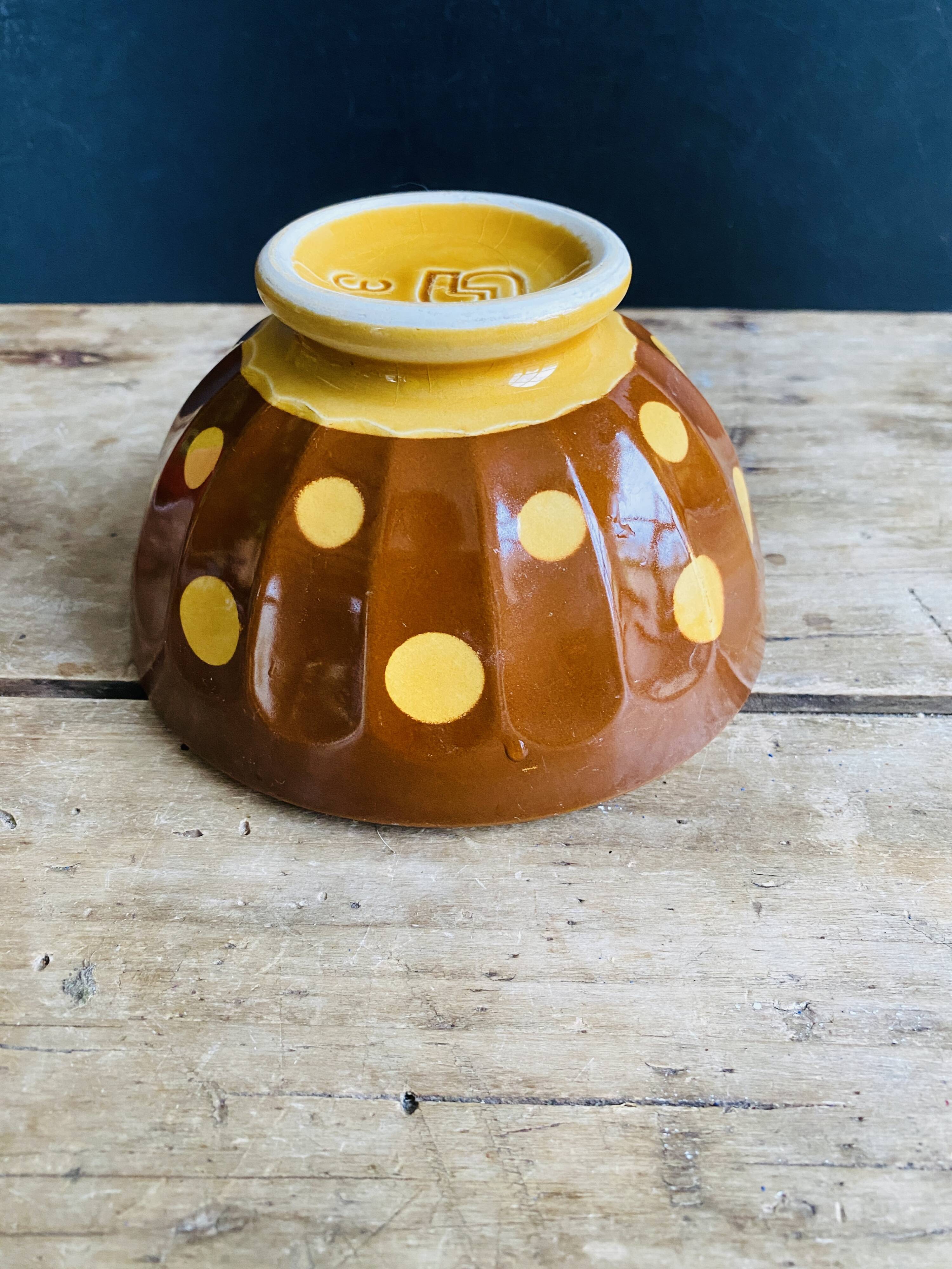 Old faceted bowl with polka dot pattern from the Sarreguemines earthenware factory