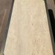 Vintage coffee table in travertine and brass.