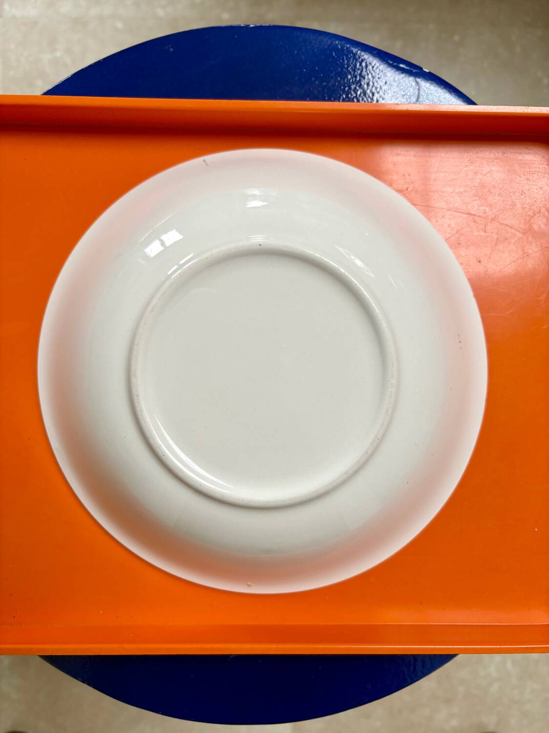 Vintage deep plate with vegetable decoration.