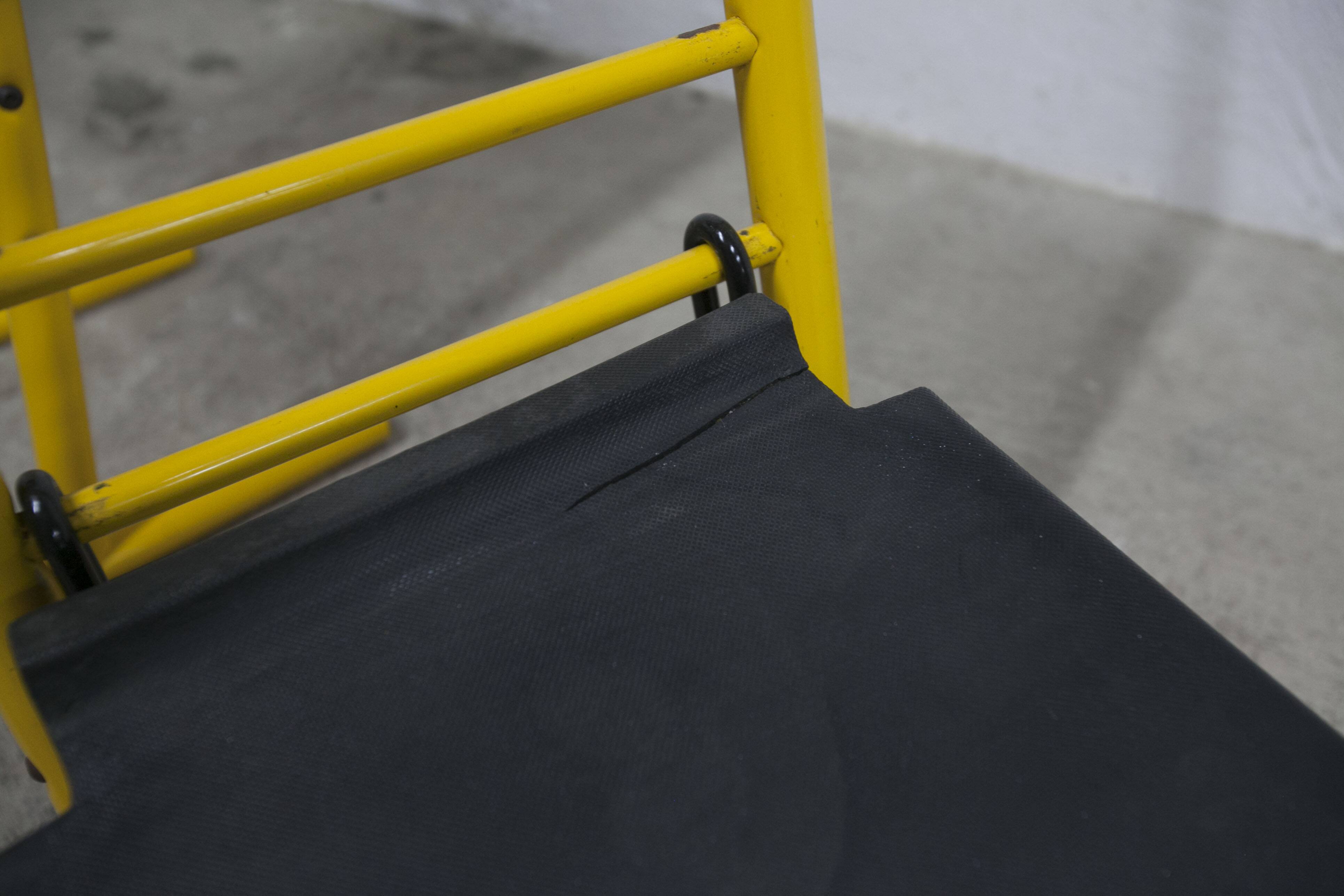 Pair of adjustable Italian bar stools in lacquered yellow and black