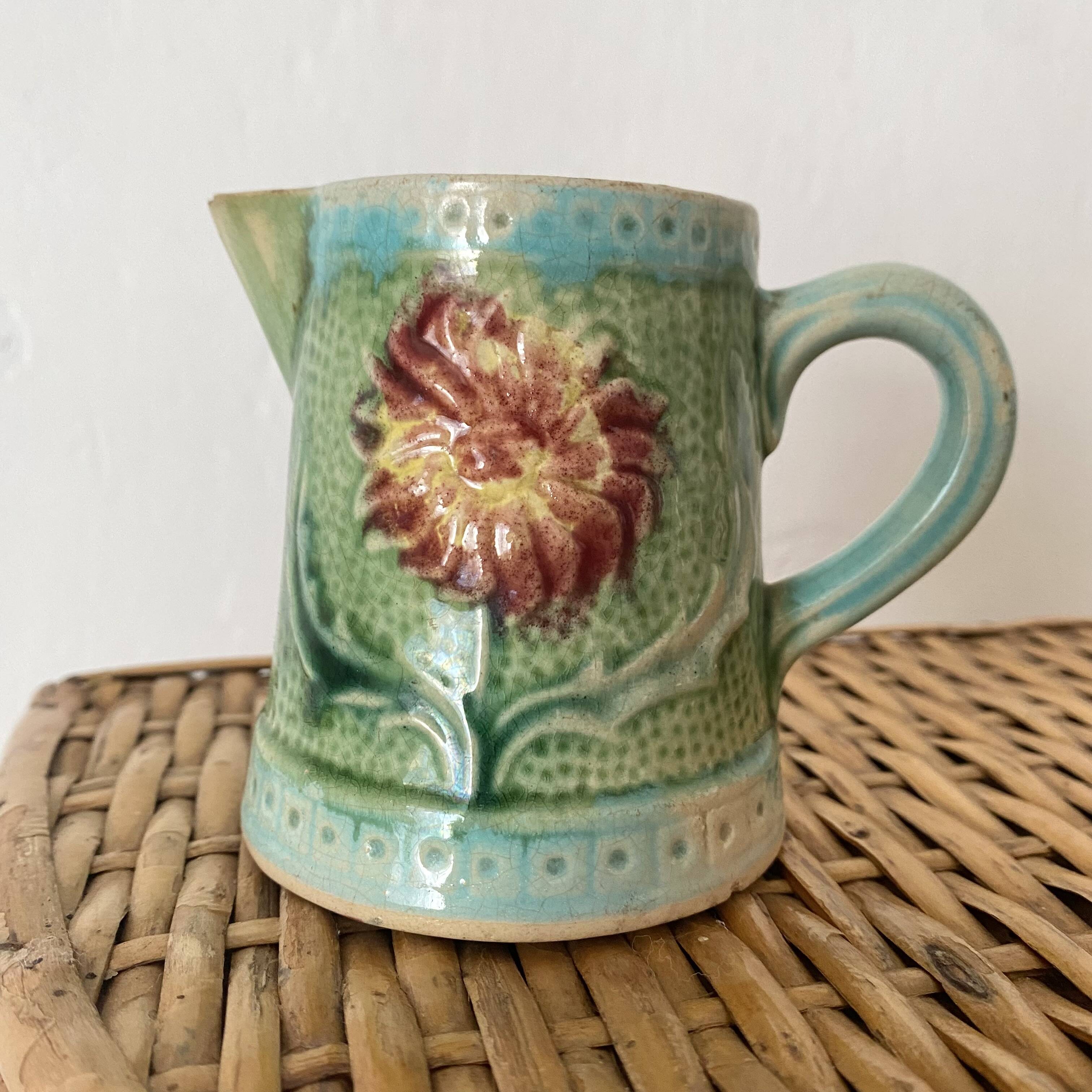 Small Art Nouveau slip milk pitcher