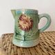 Small Art Nouveau slip milk pitcher