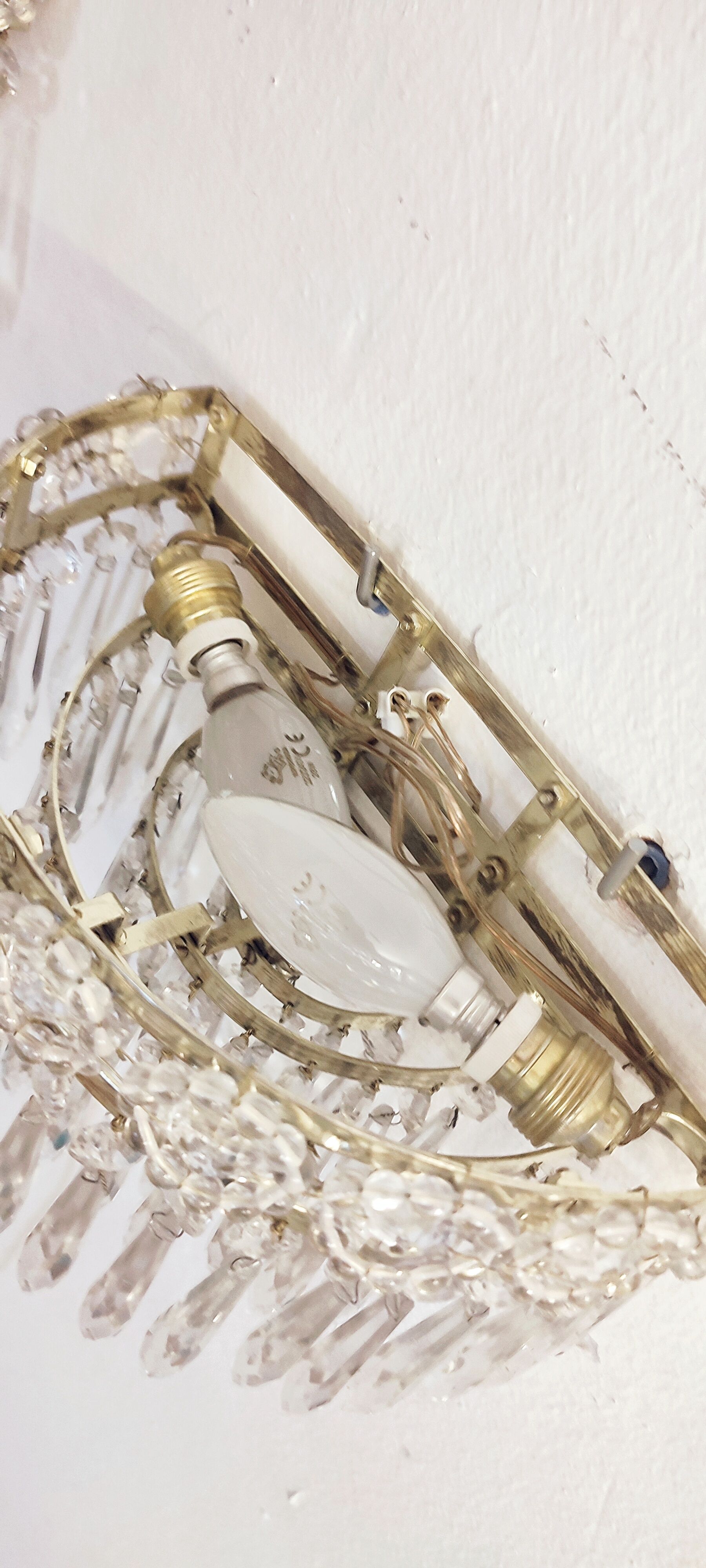 Classic crystal sconces. France, 1950s