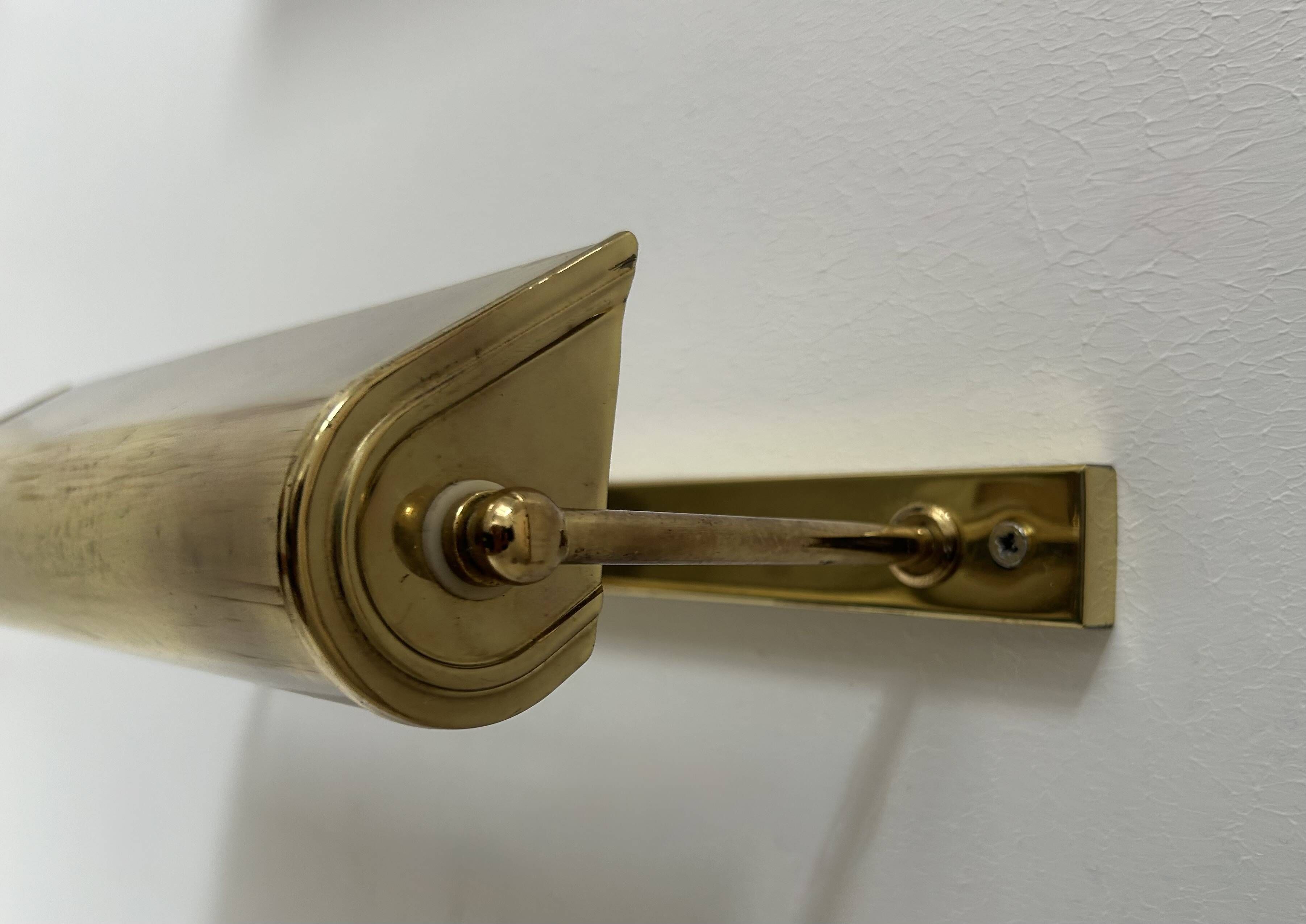 Pair of vintage adjustable brass wall lights, France, 1960s