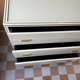 Commode Hollywood Regency crème par Pierre Vandel