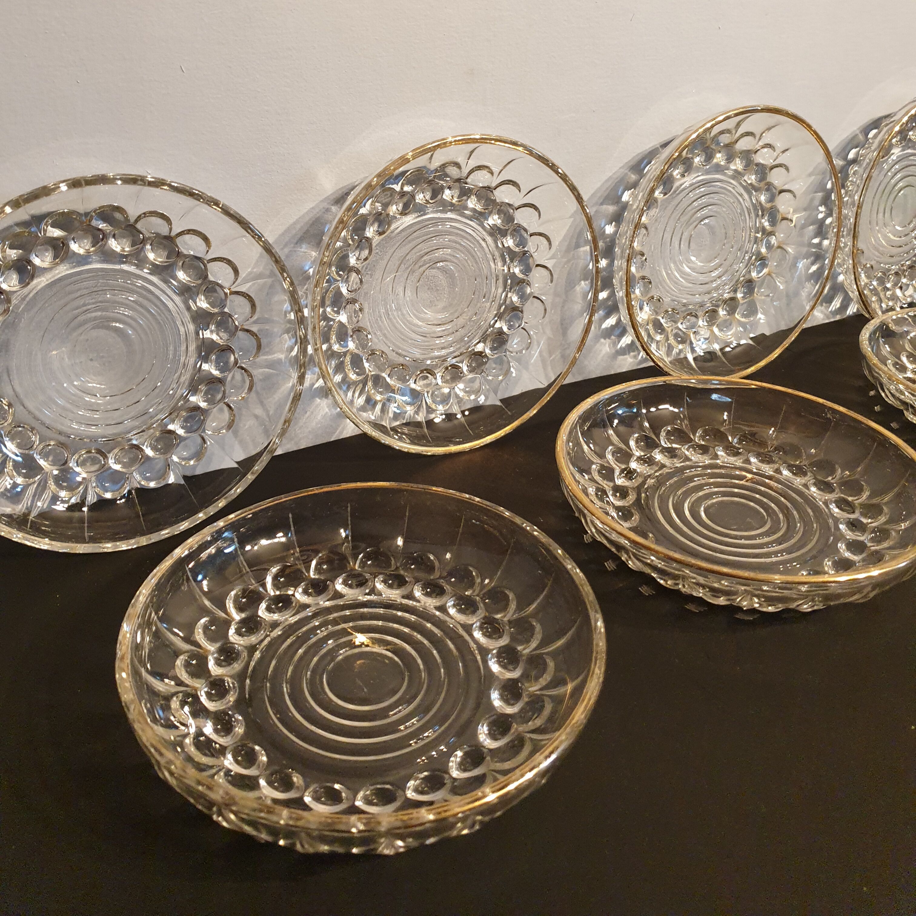 Set of 7 beaded plates