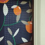 Caned cabinet with oranges