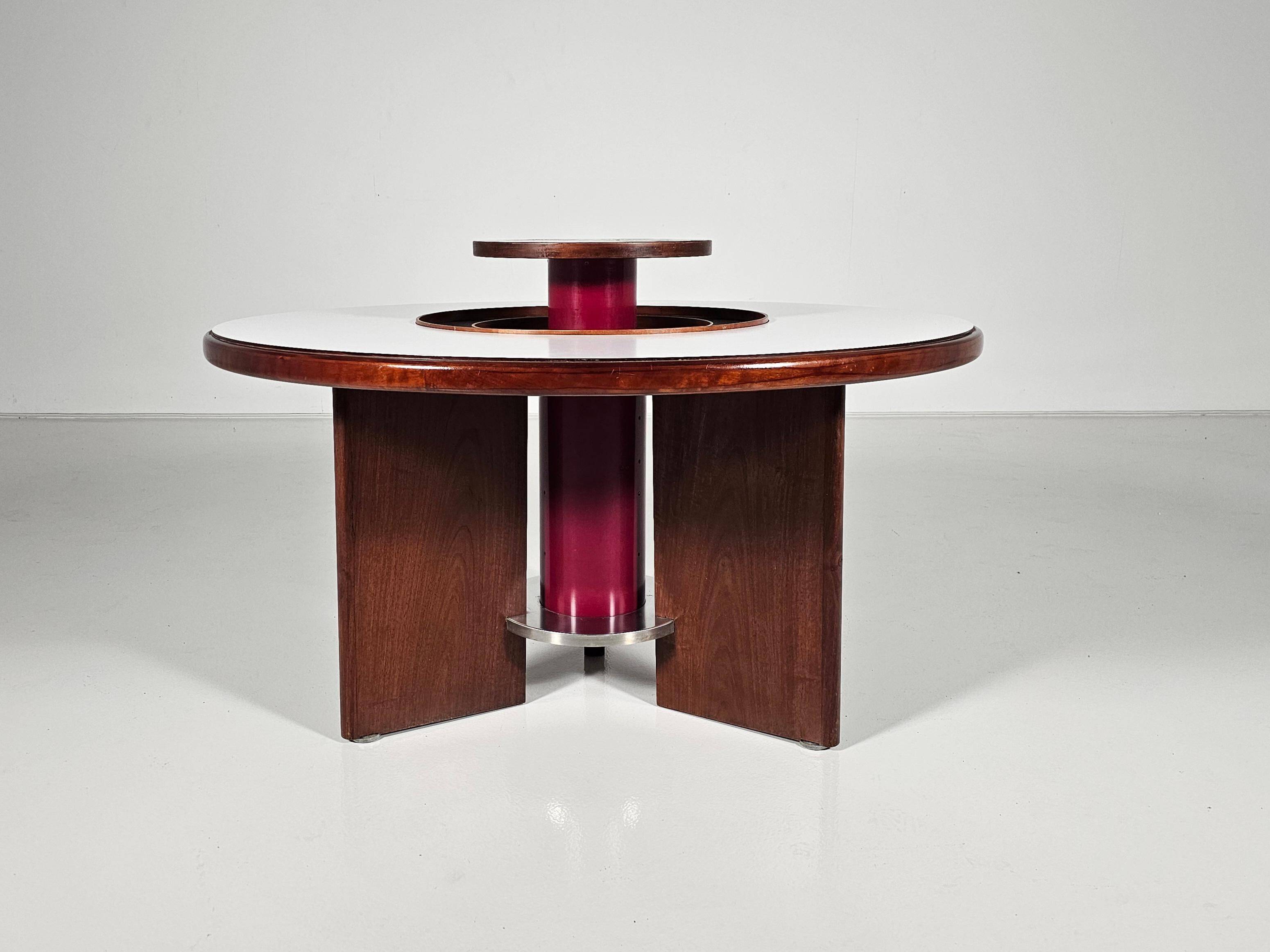 Dining table in walnut, laminate and steel by Silvio Coppola for Bernini, Italy.