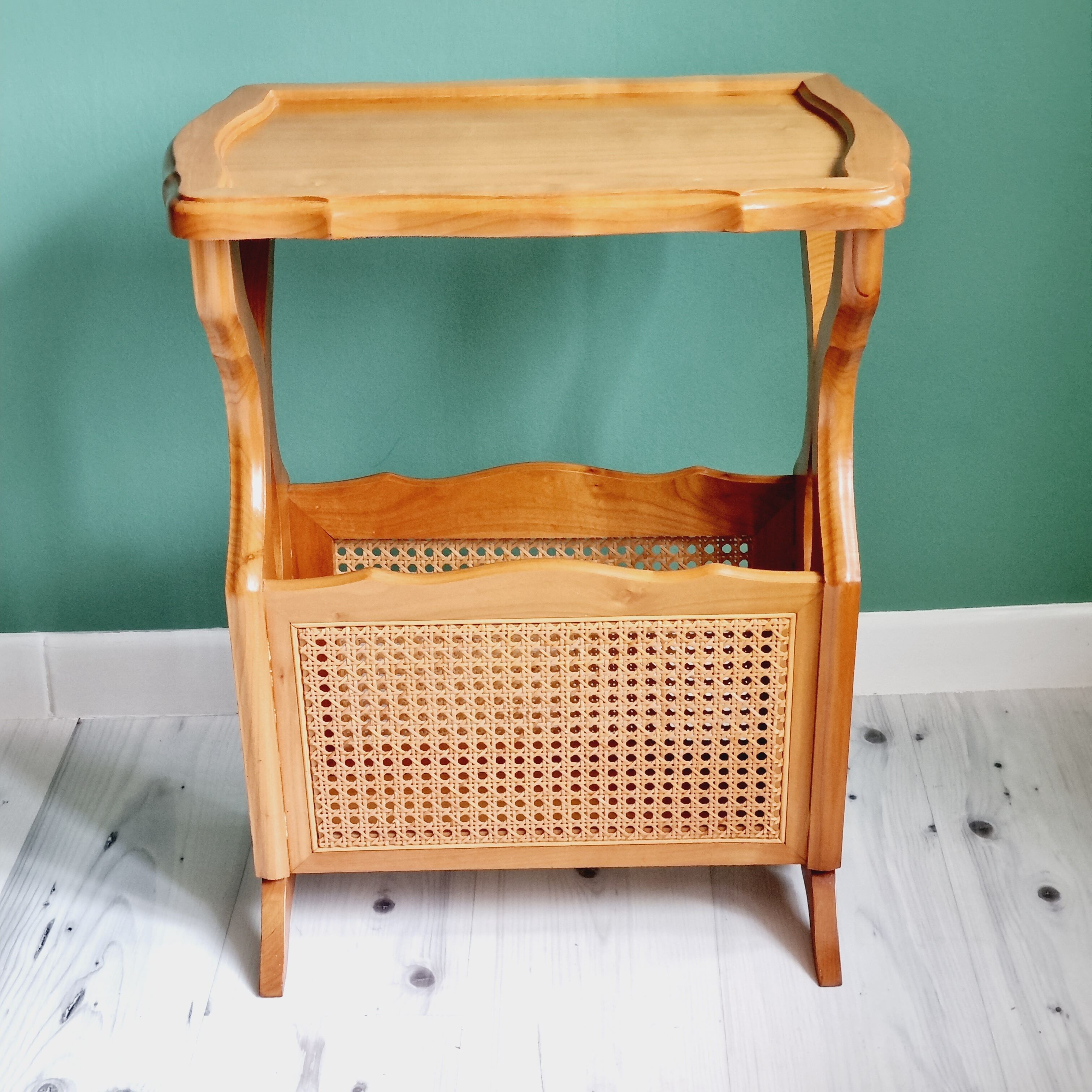 Side table with wooden and cane magazine holder