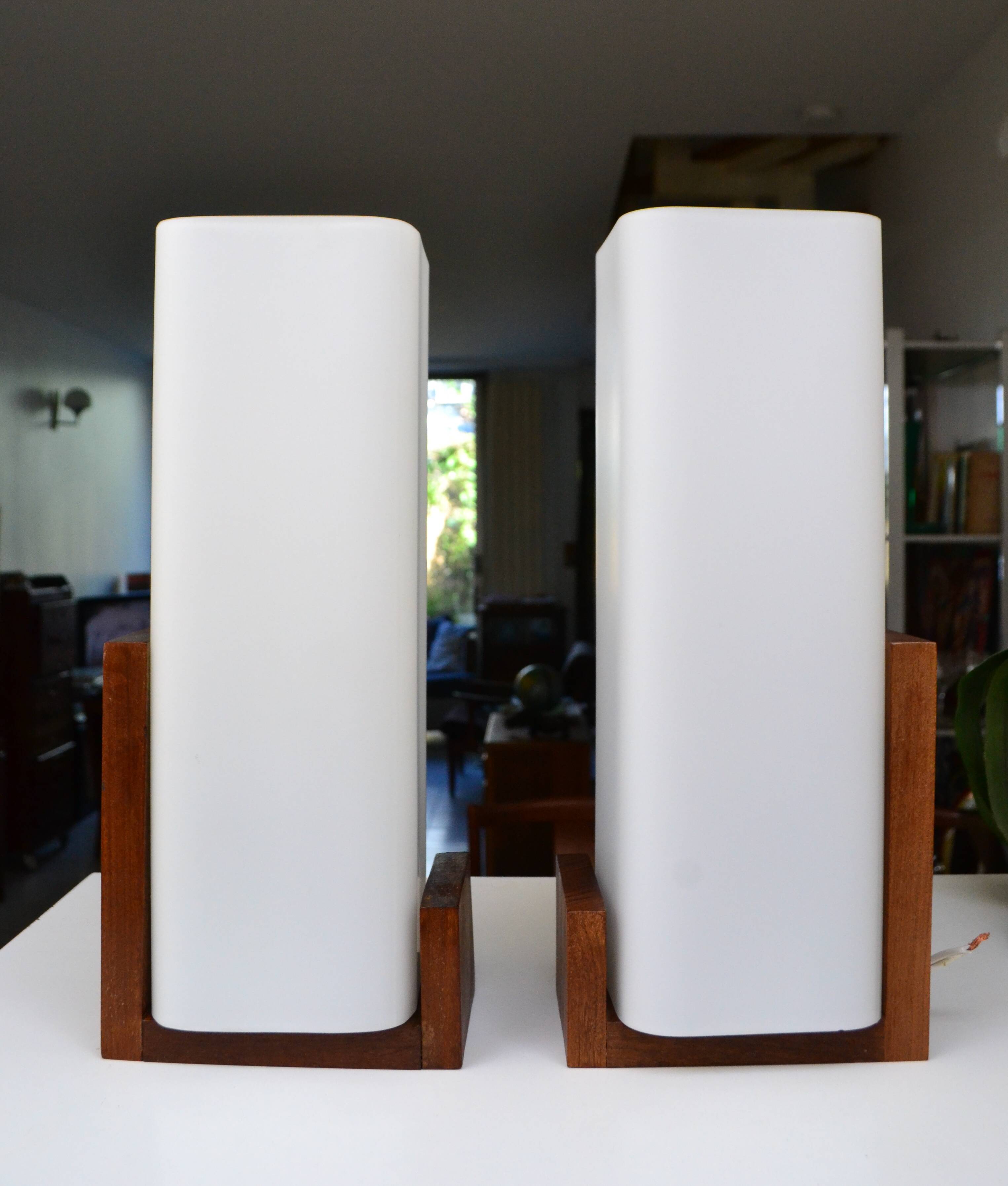 Pair of Louis Kalff opaline and teak wall lights from the 1950s/60s