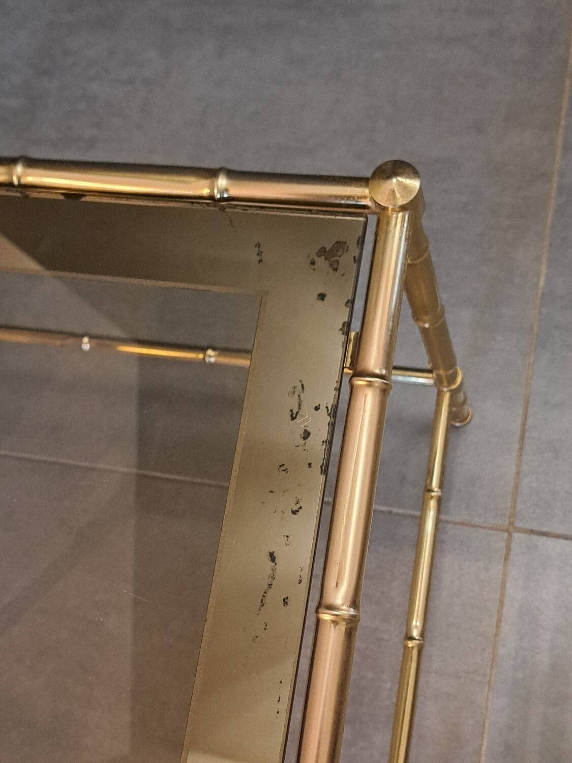 Nesting bamboo tables with gold-plated brass trim
