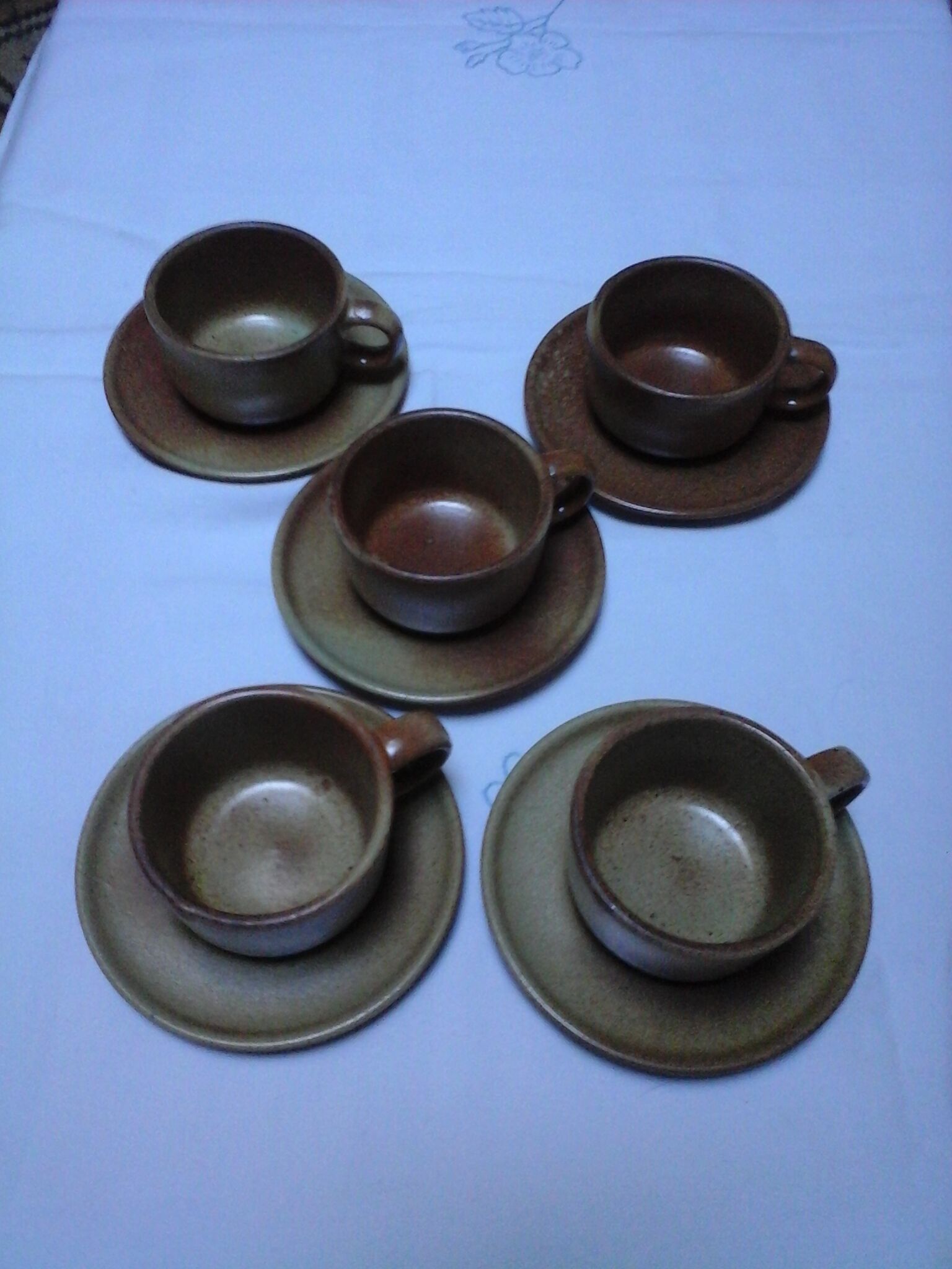 5 Cups with sandstone saucers