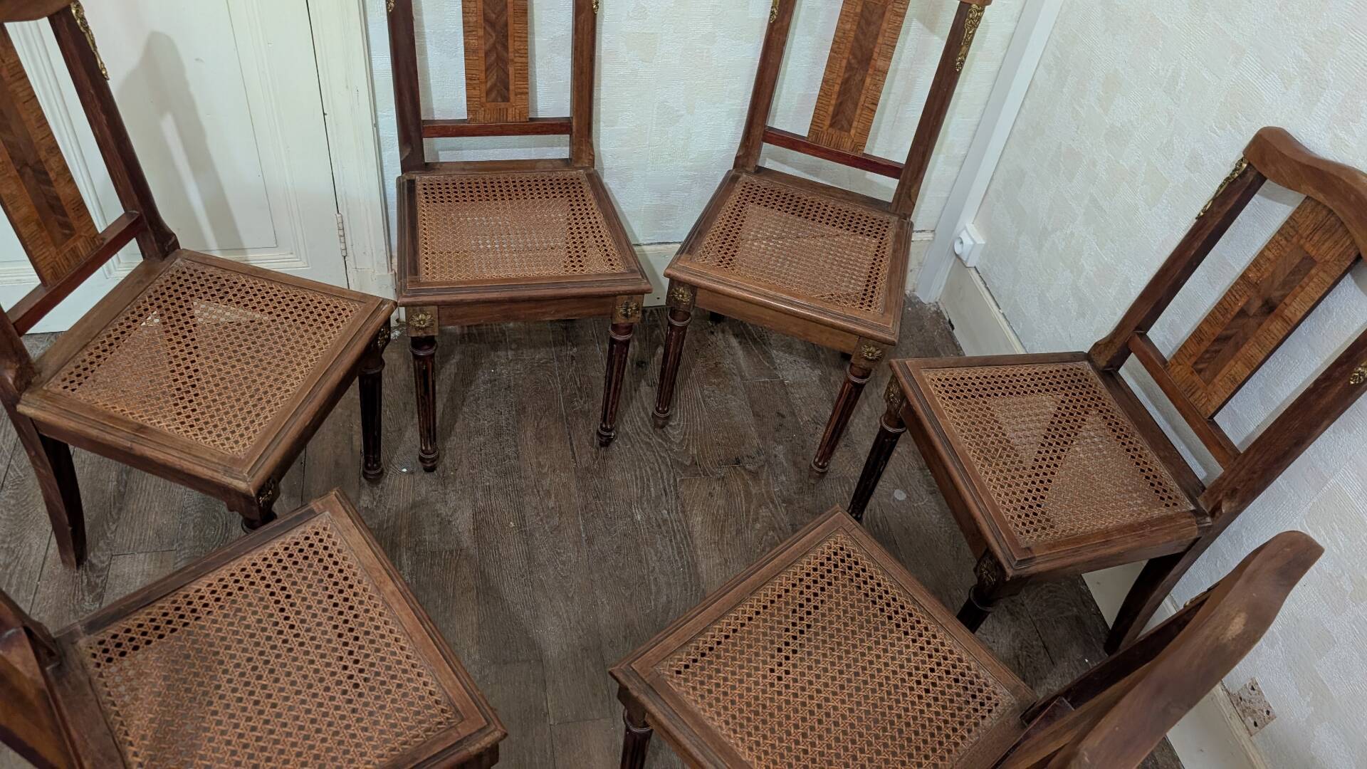 Set of 6 Louis XVI chairs in marquetry wood and caning.