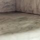 Antique wooden bathroom cabinet with painted finish and white marble.