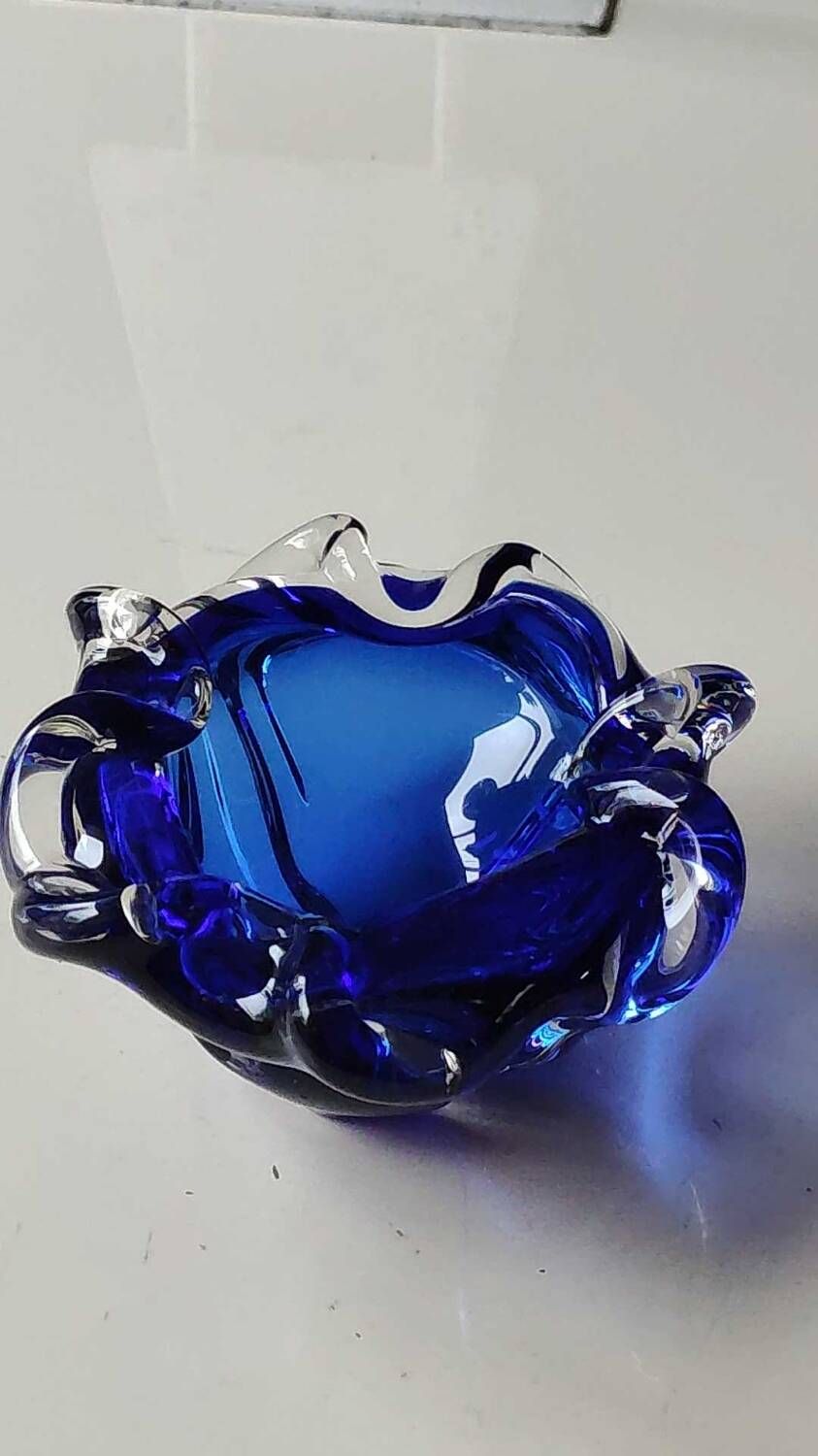 Empty pocket blown art glass from Murano Italy, corolla shape, cobalt blue