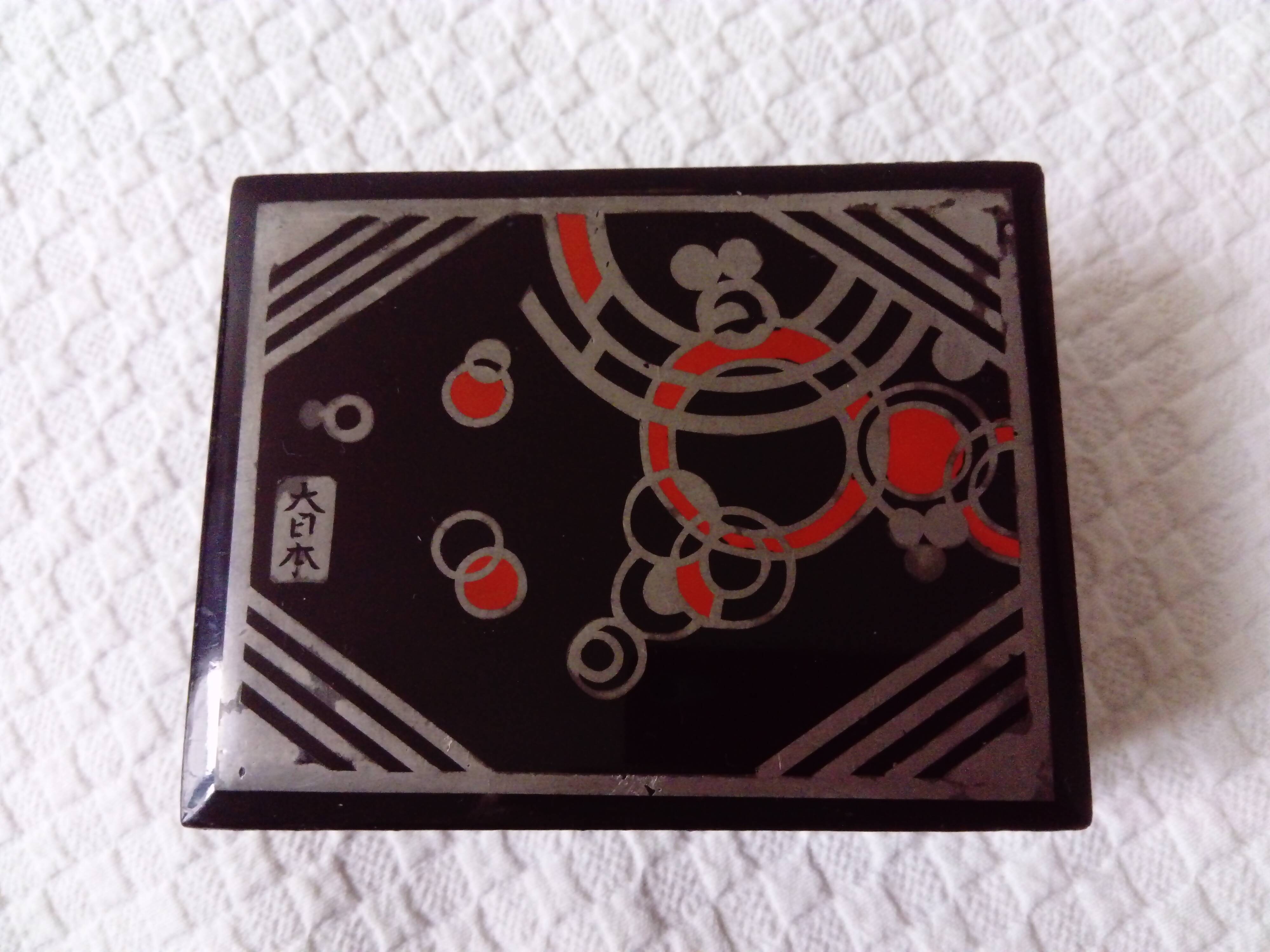 Small black lacquered box with Art Deco decor.Japan