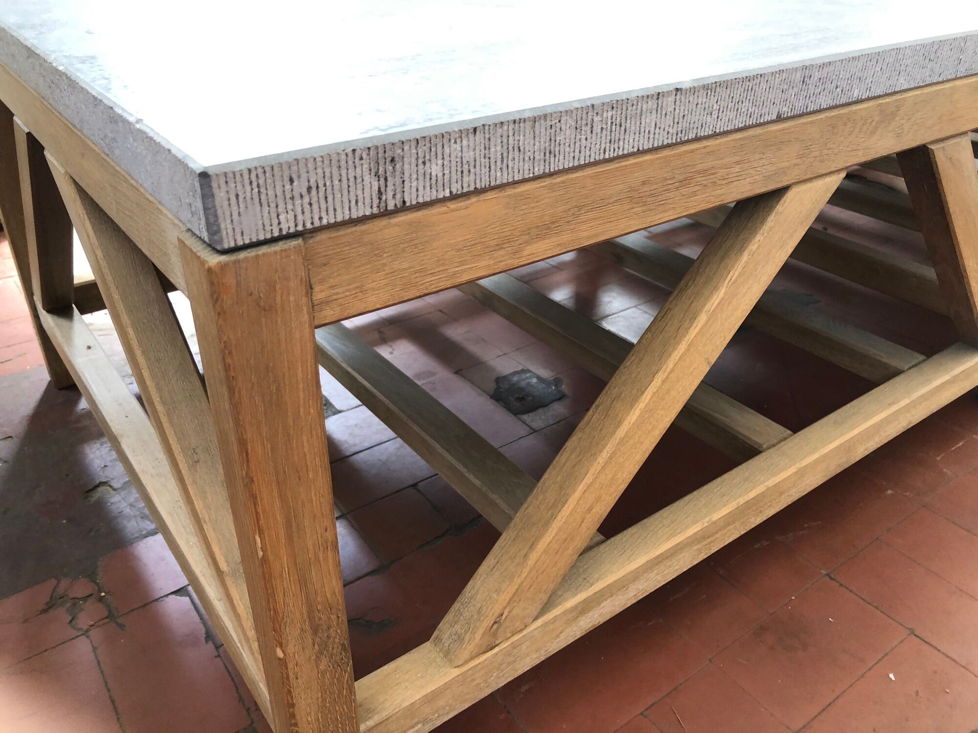 Coffee table in natural oak and top in blue stone of Flamant