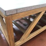 Coffee table in natural oak and top in blue stone of Flamant