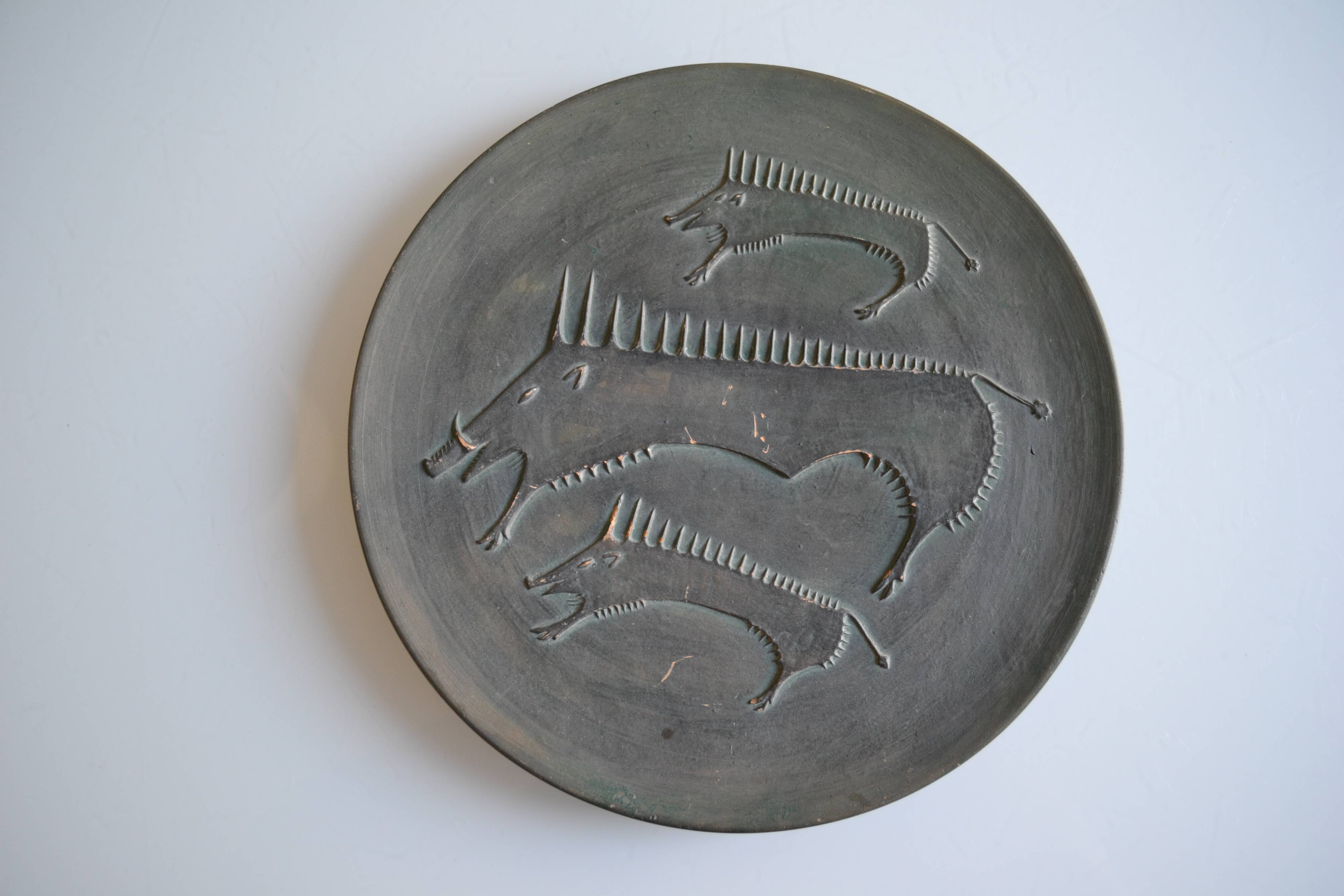 Ceramic wall plate attributed to Wim Mühlendyk