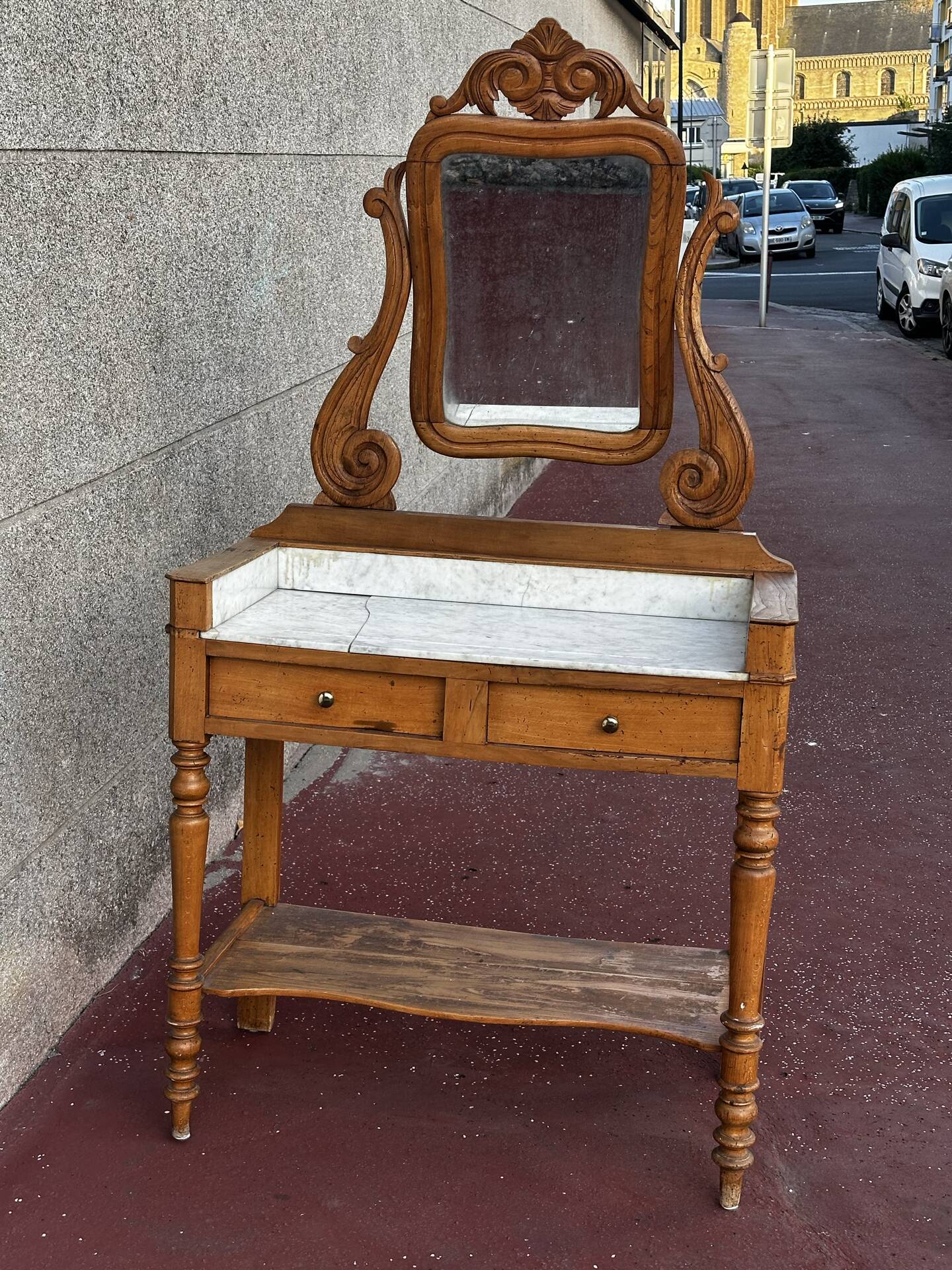 Walnut and marble dressing table, mercury mirror, circa 1850.