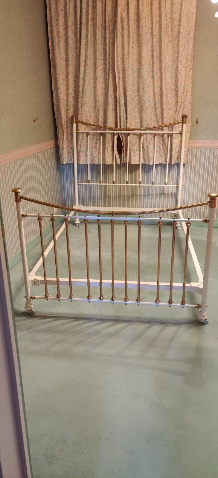 Restored old iron bed