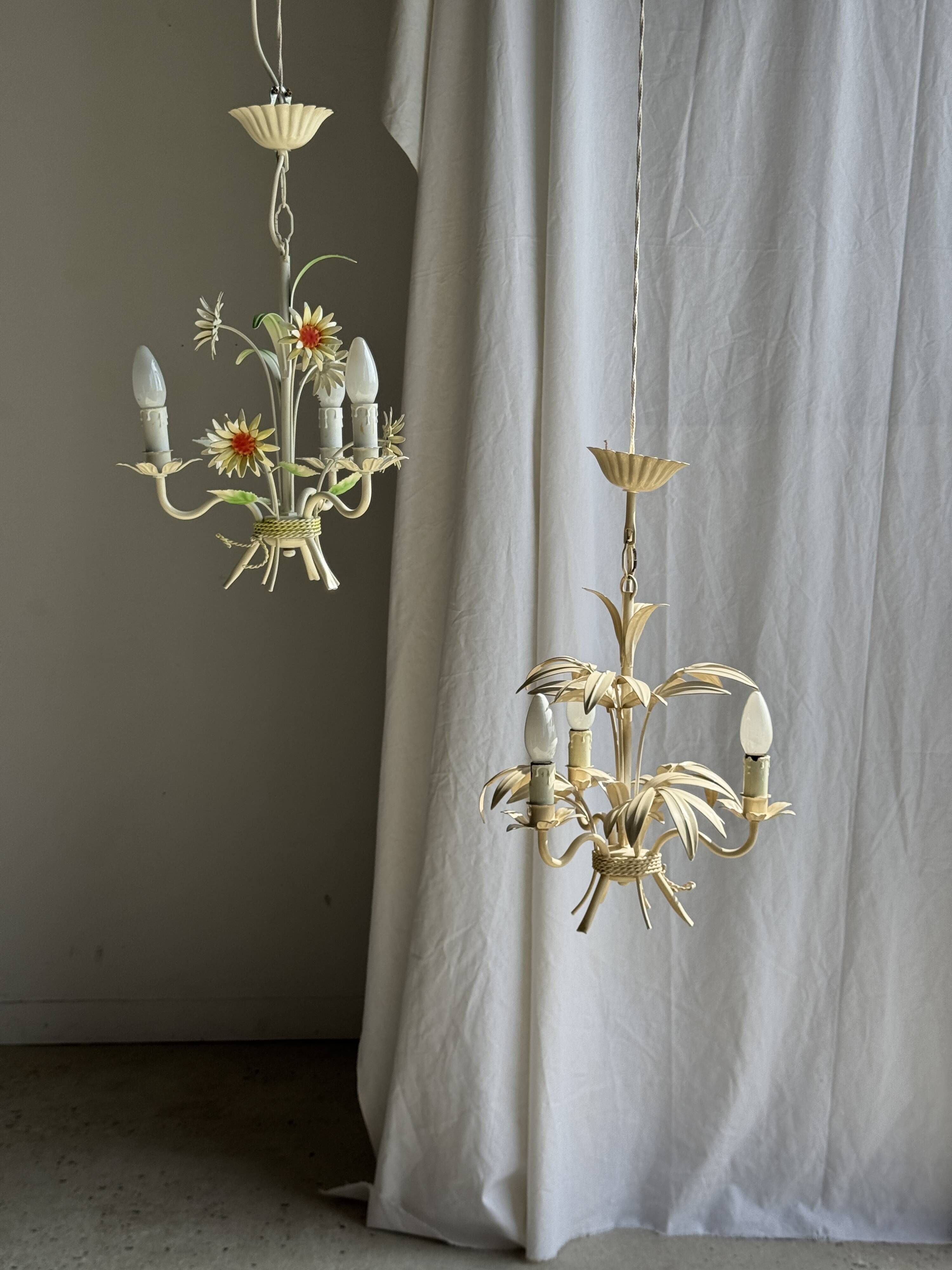 Small vintage cream metal flower chandelier with orange flowers and 3 arms.
