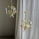 Small vintage cream metal flower chandelier with orange flowers and 3 arms.