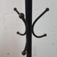 vintage black coat rack with 'golden' accent