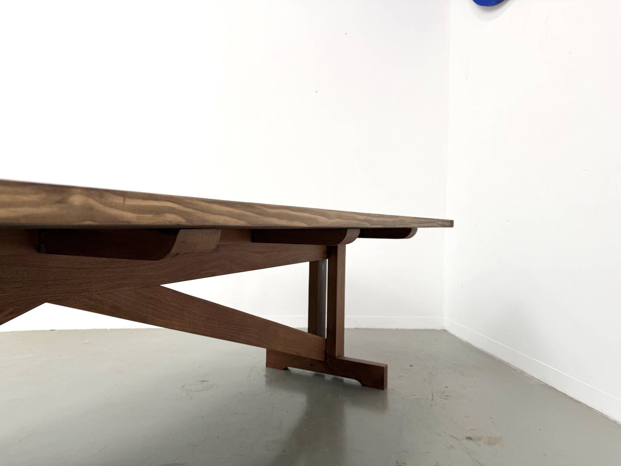Refectory table in solid pine and beech, with X-shaped legs.