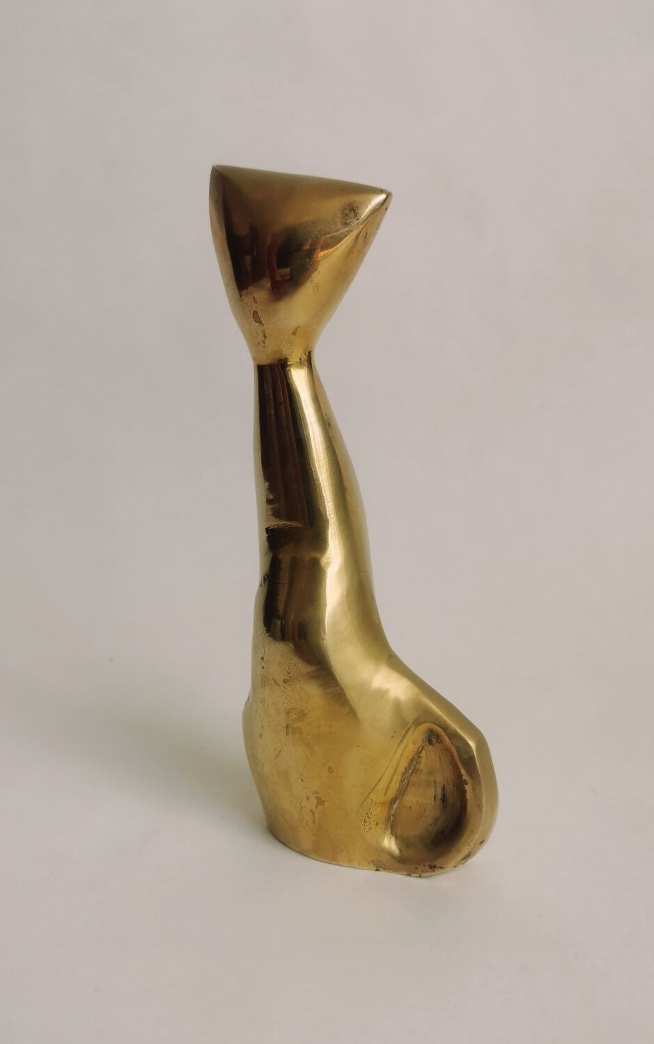 Trio of cats in gilded brass