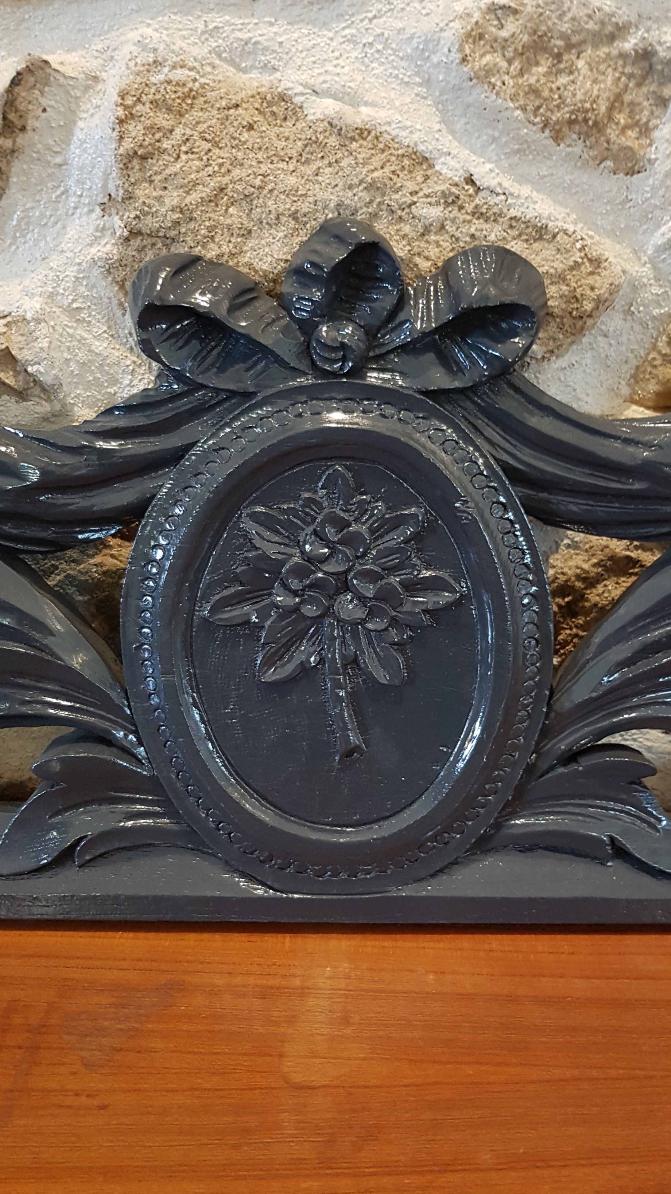 Old carved wooden pediment