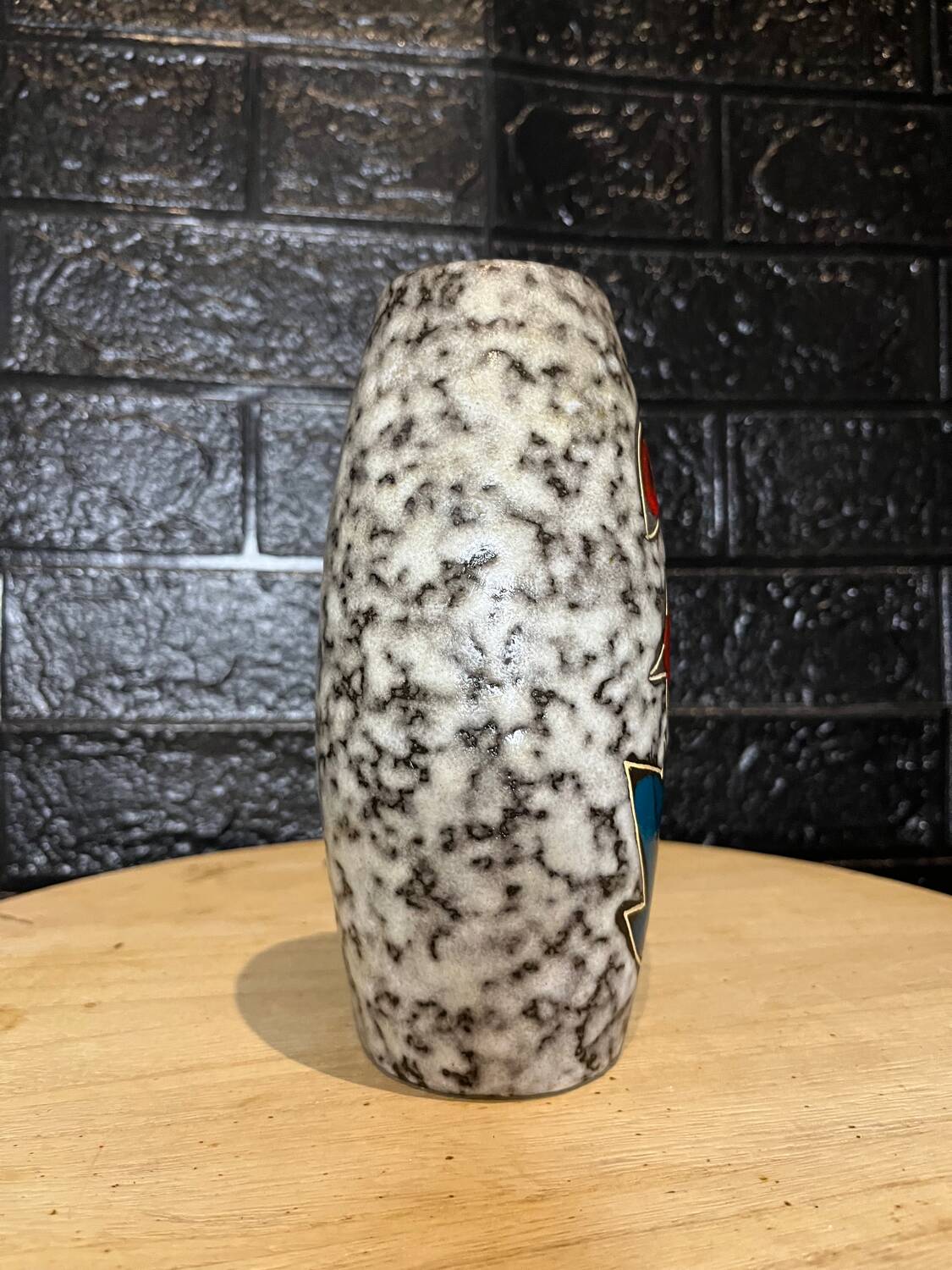Ceramic vase with flower decor