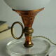 Vintage globe lamp in glass, copper, and brass.