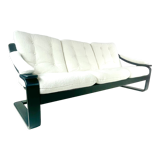 Three-seater sofa, removable cushions reupholstered in white teddy, circa 1970