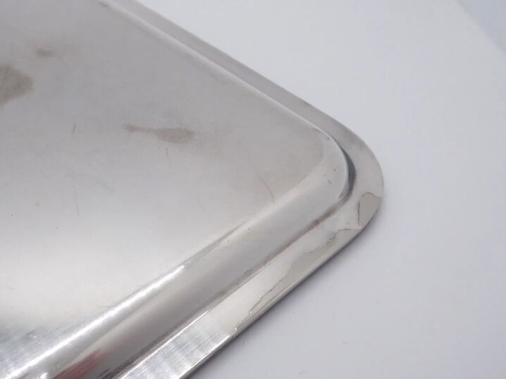 Small silver metal top