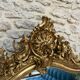 Antique mirror 183.5/116cm with pediments and pearl detailing in gold leaf.
