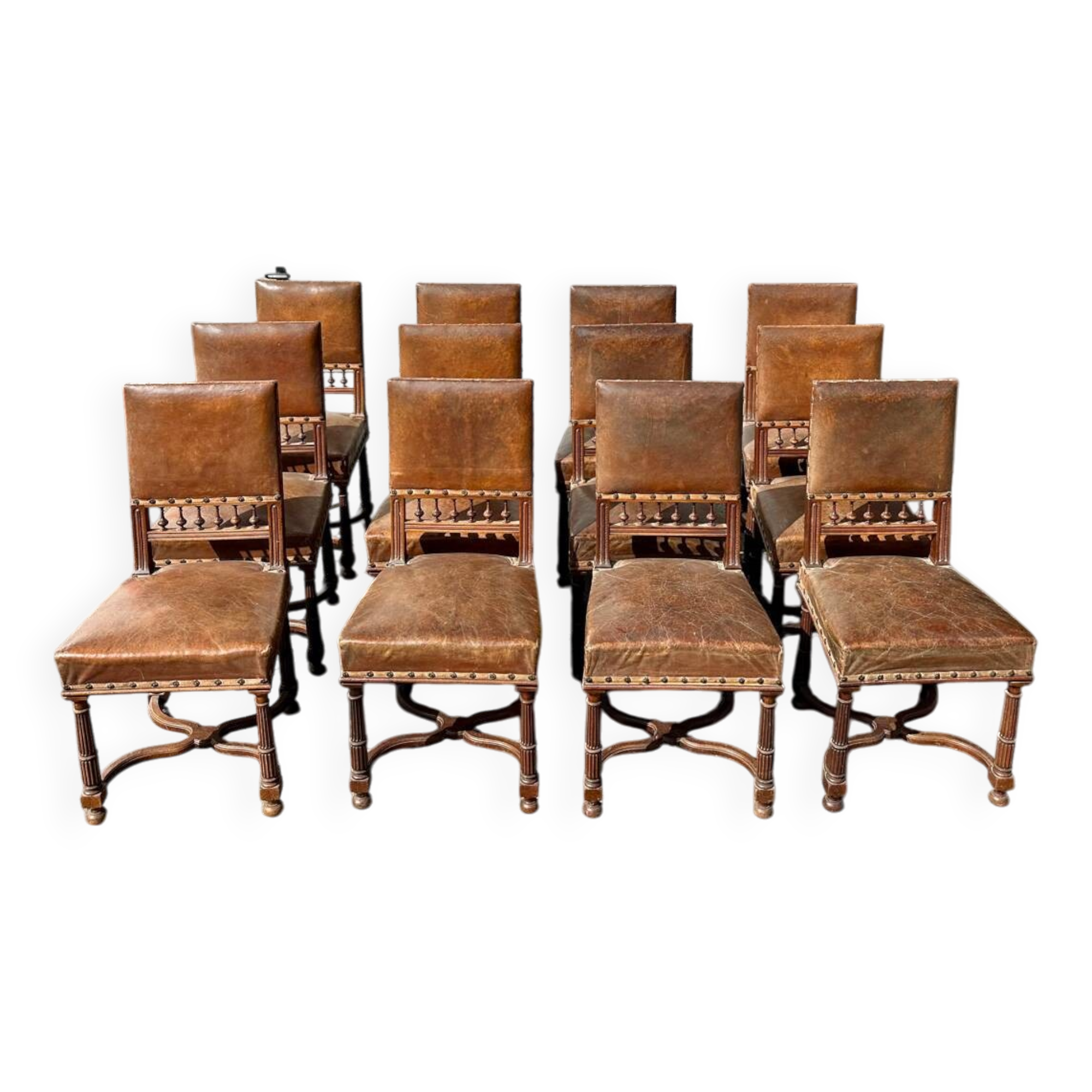 Set of 12 Henri II neo-Renaissance style walnut chairs