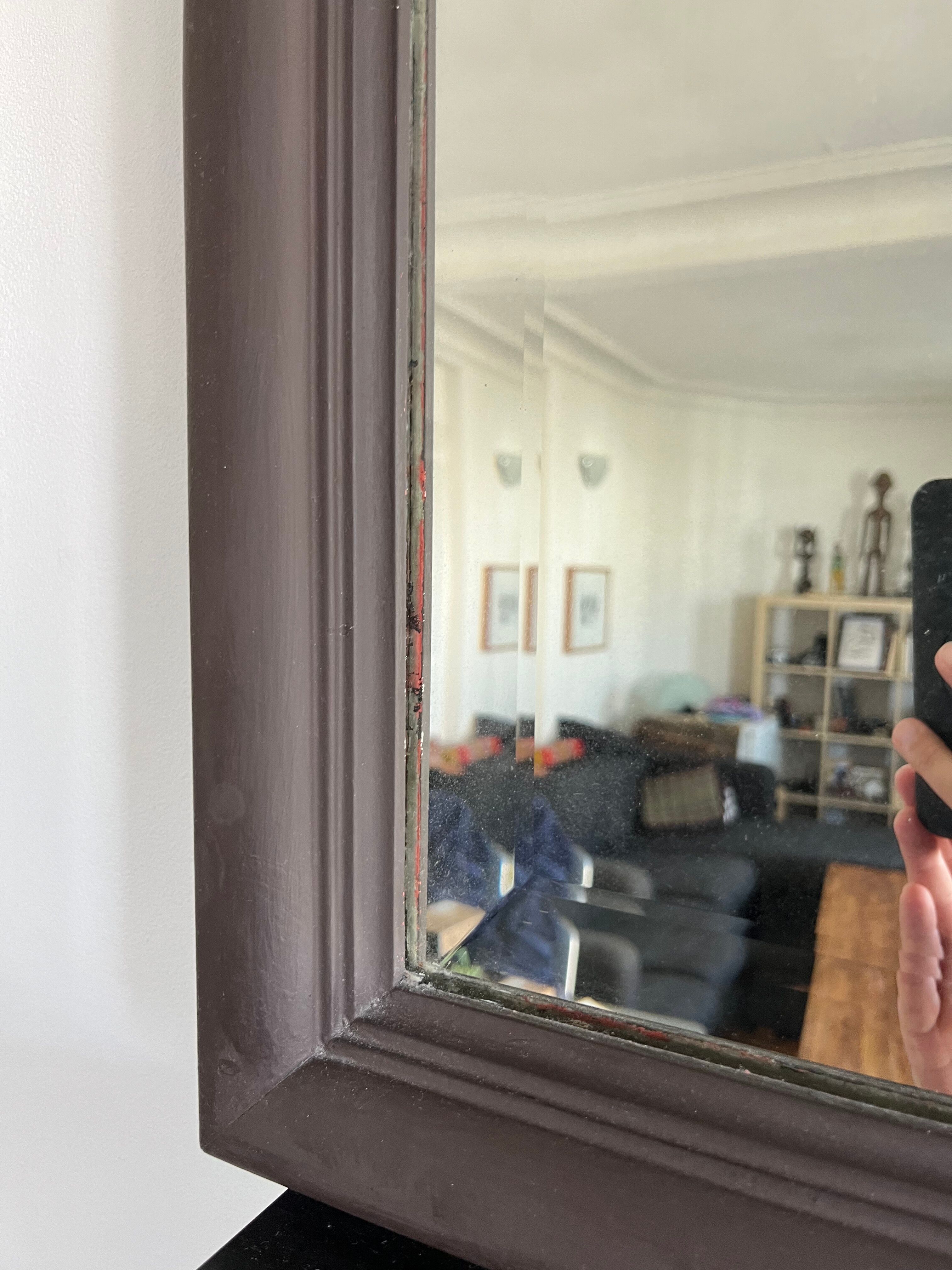 Beveled vintage mirror in painted wood 95x68cm