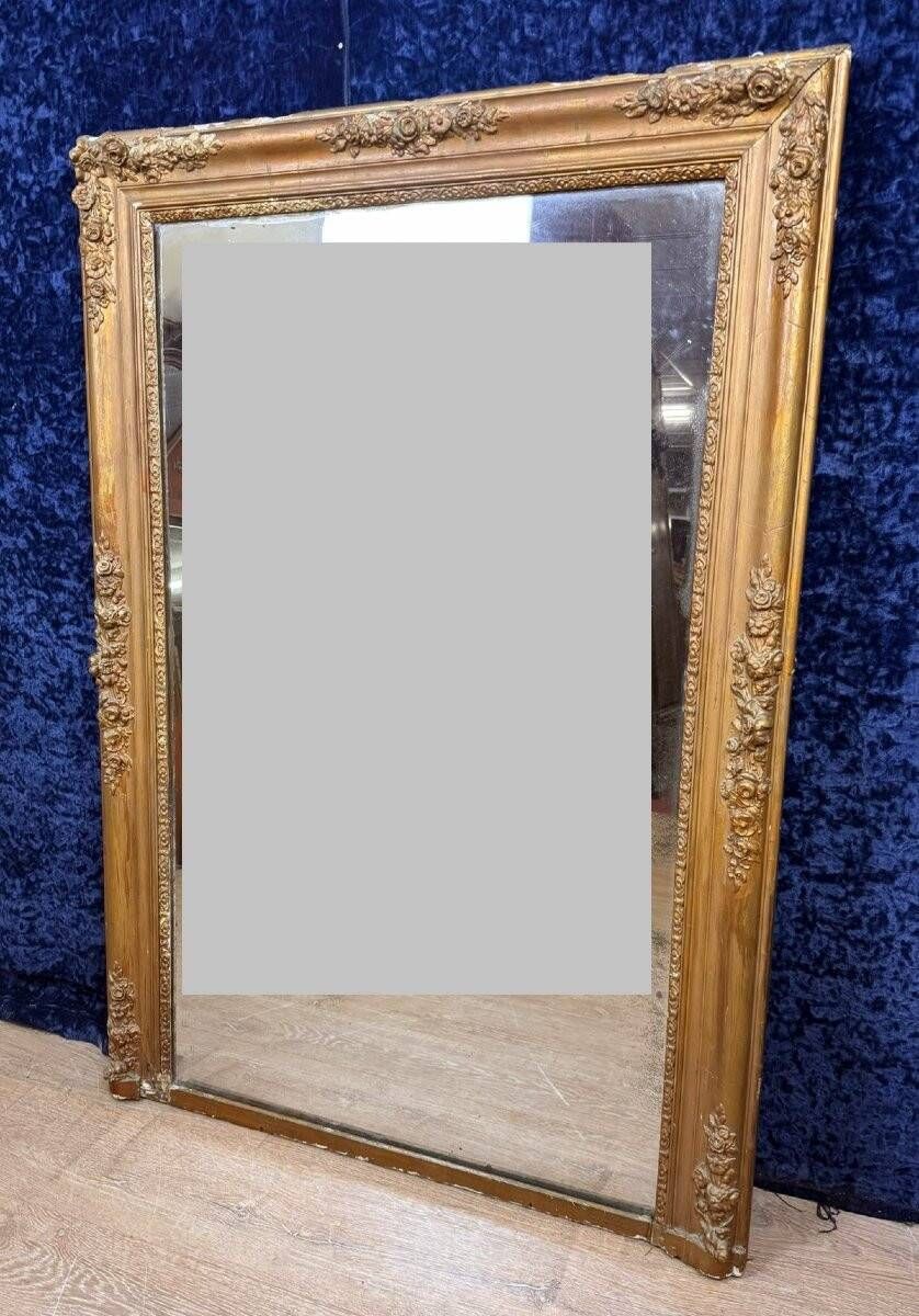 Empire period mirror in wood and gilded stucco circa 1810-1820