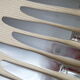 Box of 12 one-piece stainless steel table knives