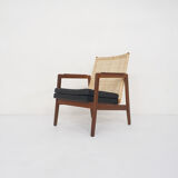 Rattan and leather low-back lounge chair by P.J. Muntendam for Gebr. Jonkers, The Netherlands 1950's